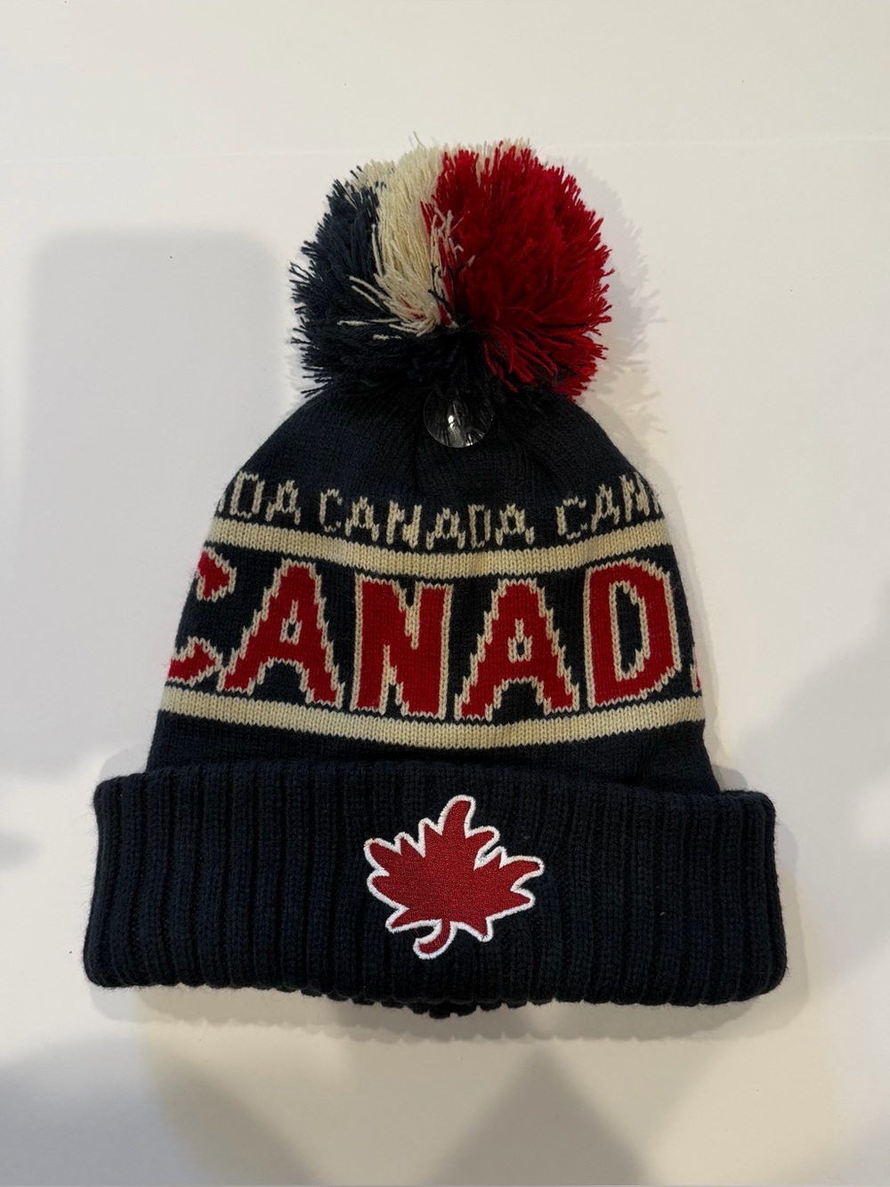 Canada Knit Pom Beanie Hat - Navy, Red, Cream